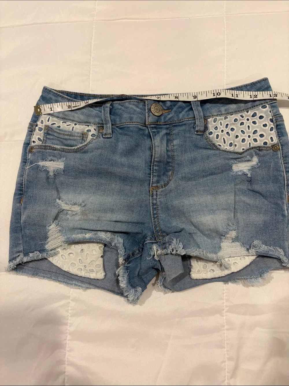 Mudd Light Blue Distressed Denim Shorts with White Eyelet Inset